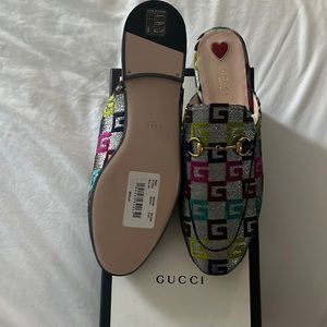 Brand new, never worn Gucci slides (retail at $860) size 40